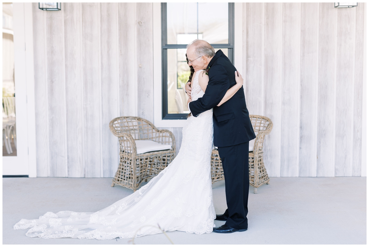 father hugging bride first look outdoors at Arrowhead Hill wedding venue