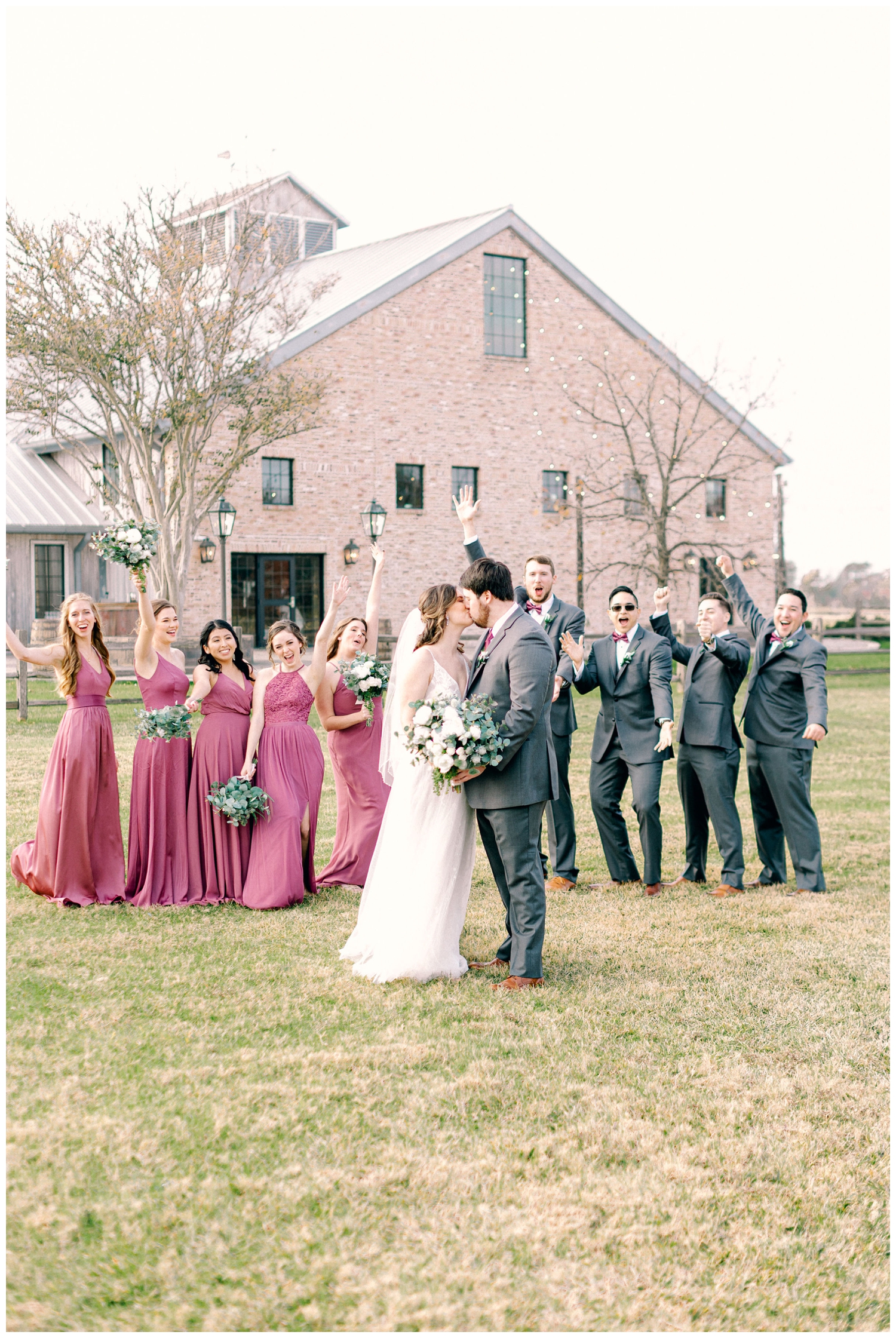 bridal party in rose dresses and gray suit outside Beckendorff Farms wedding