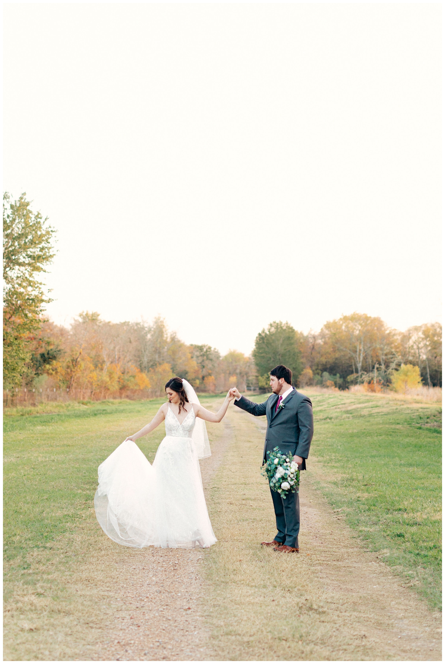 bride and groom twirling outside at Beckendorff Farms wedding
