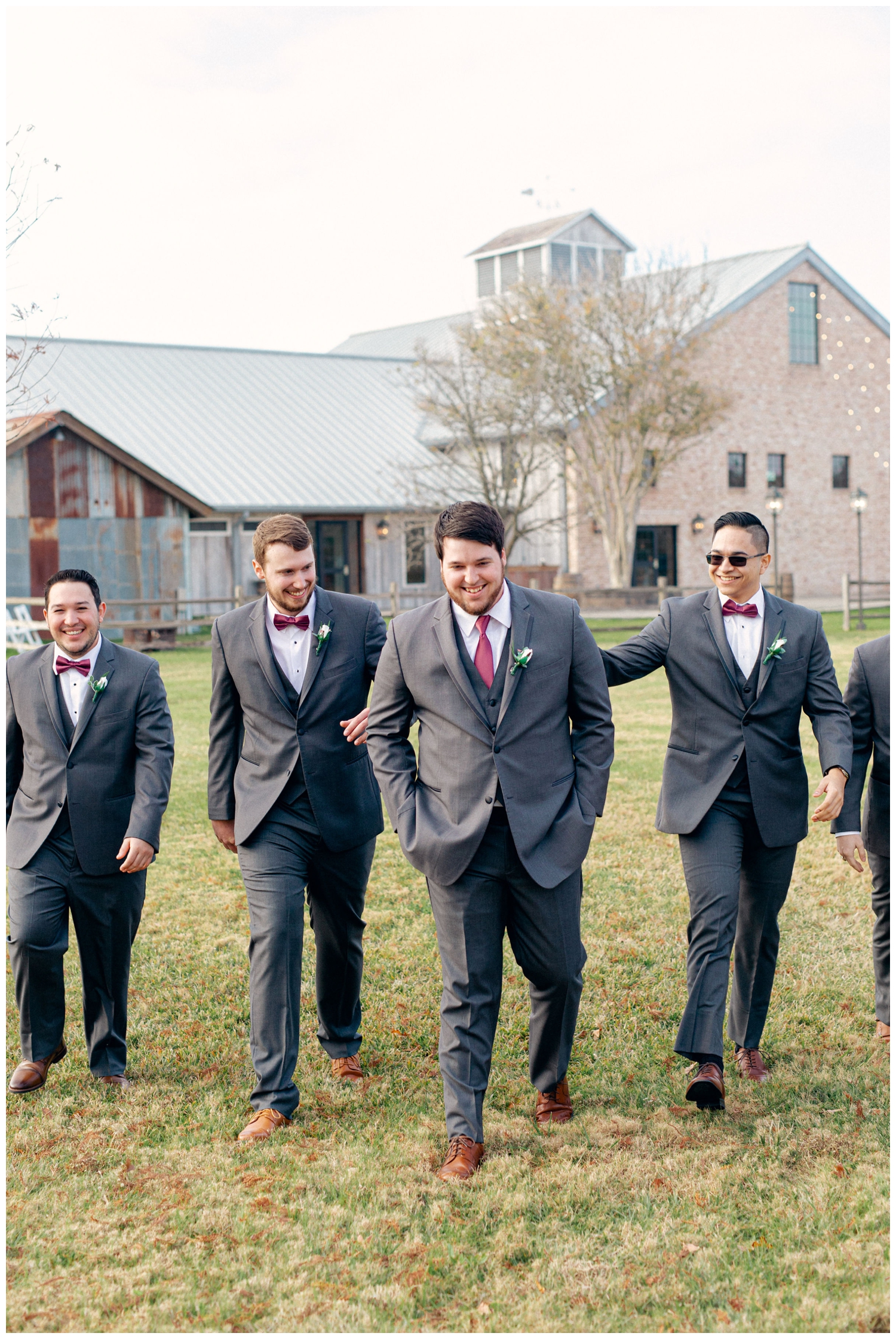 groom with groomsmen standing outside the reception hall at Beckendorff Farms wedding