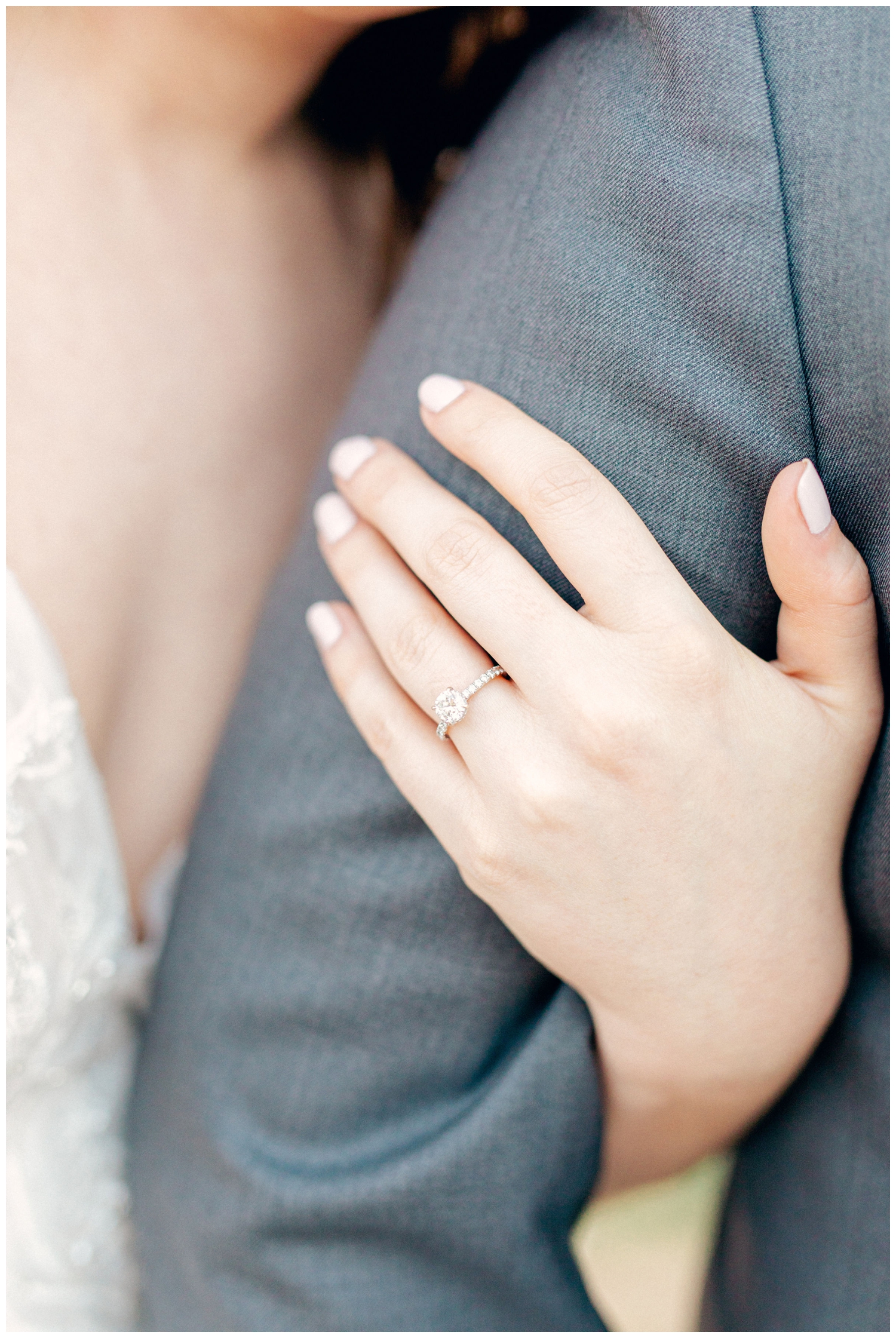 close up of brides hand with wedding ring