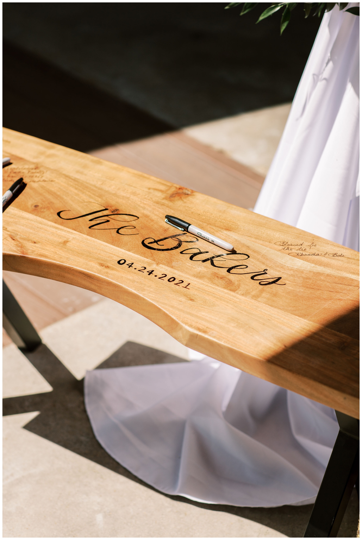 engraved bench for wedding guests to sign