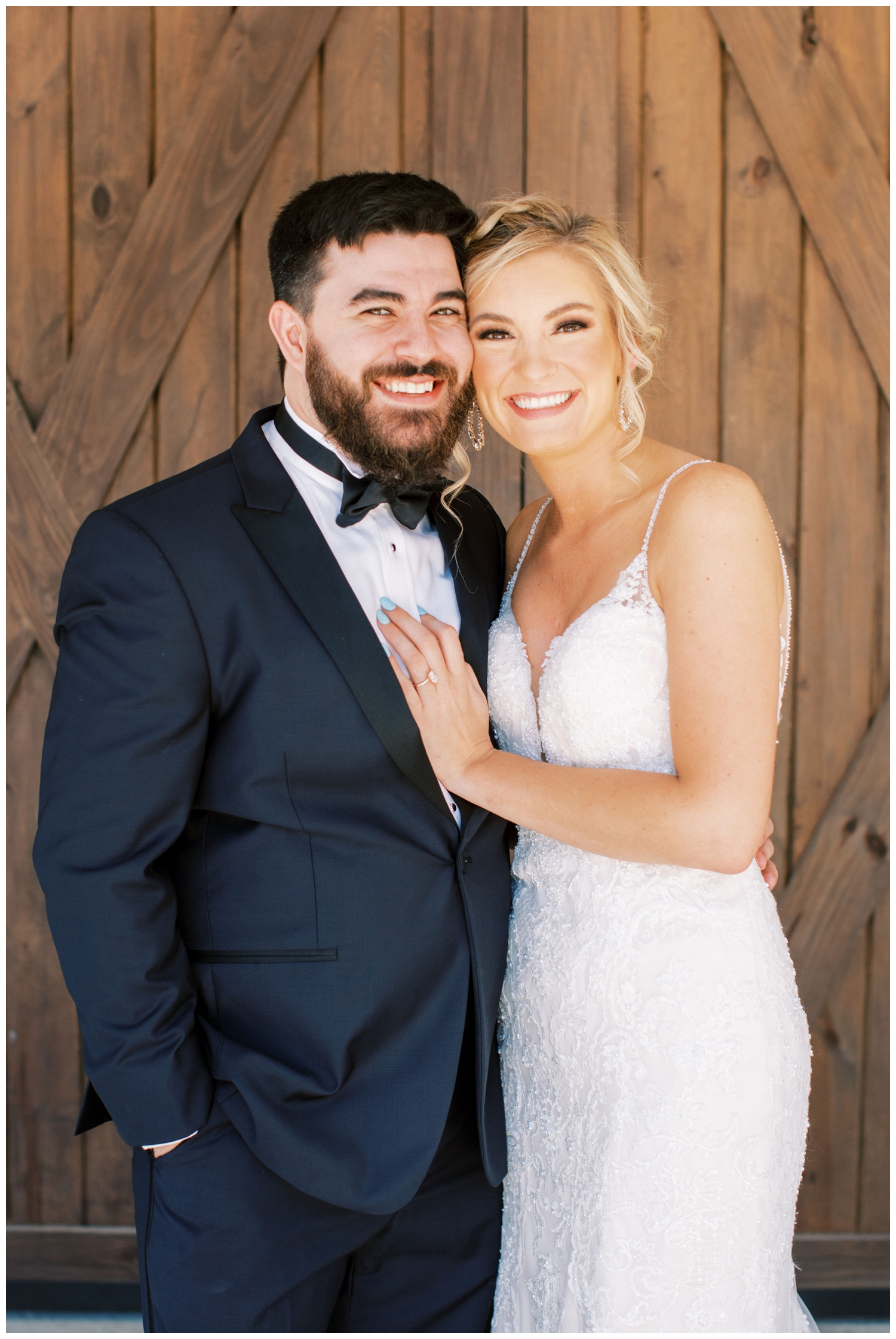 bride and groom smiling at the camera in College Station at Peach Creek Ranch Wedding venue