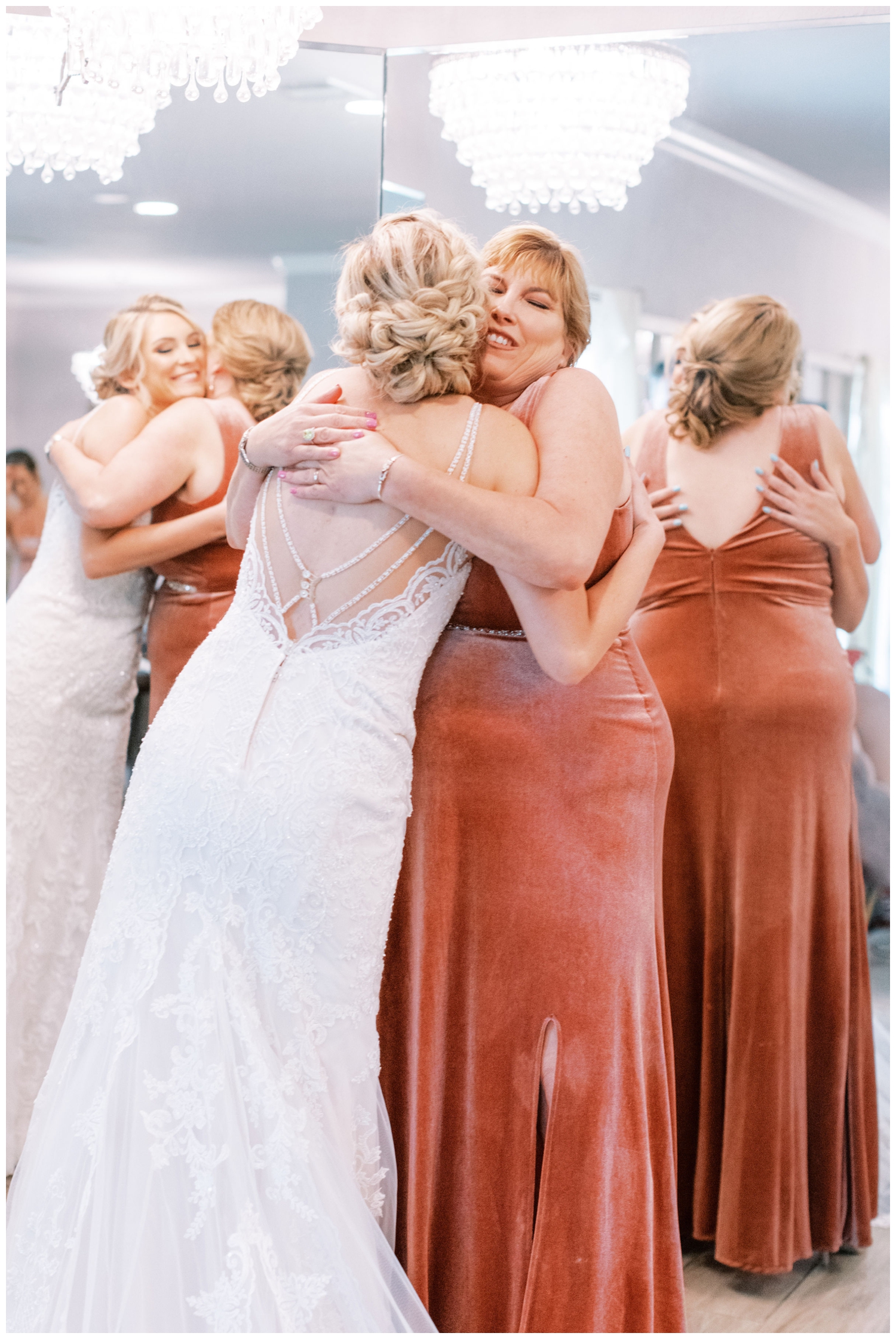 bride and mom hugging during getting ready portraits