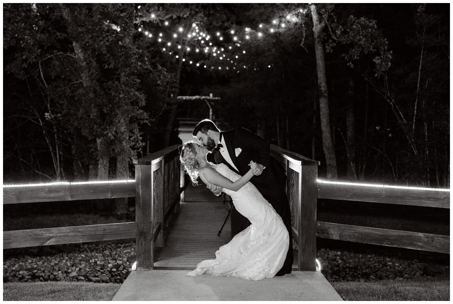 black and white night time portrait on bridge Peach Creek Ranch wedding