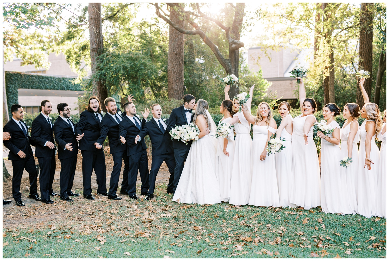 bridal party dressed in black and white on the lawn at the Houstonian Hotel wedding
