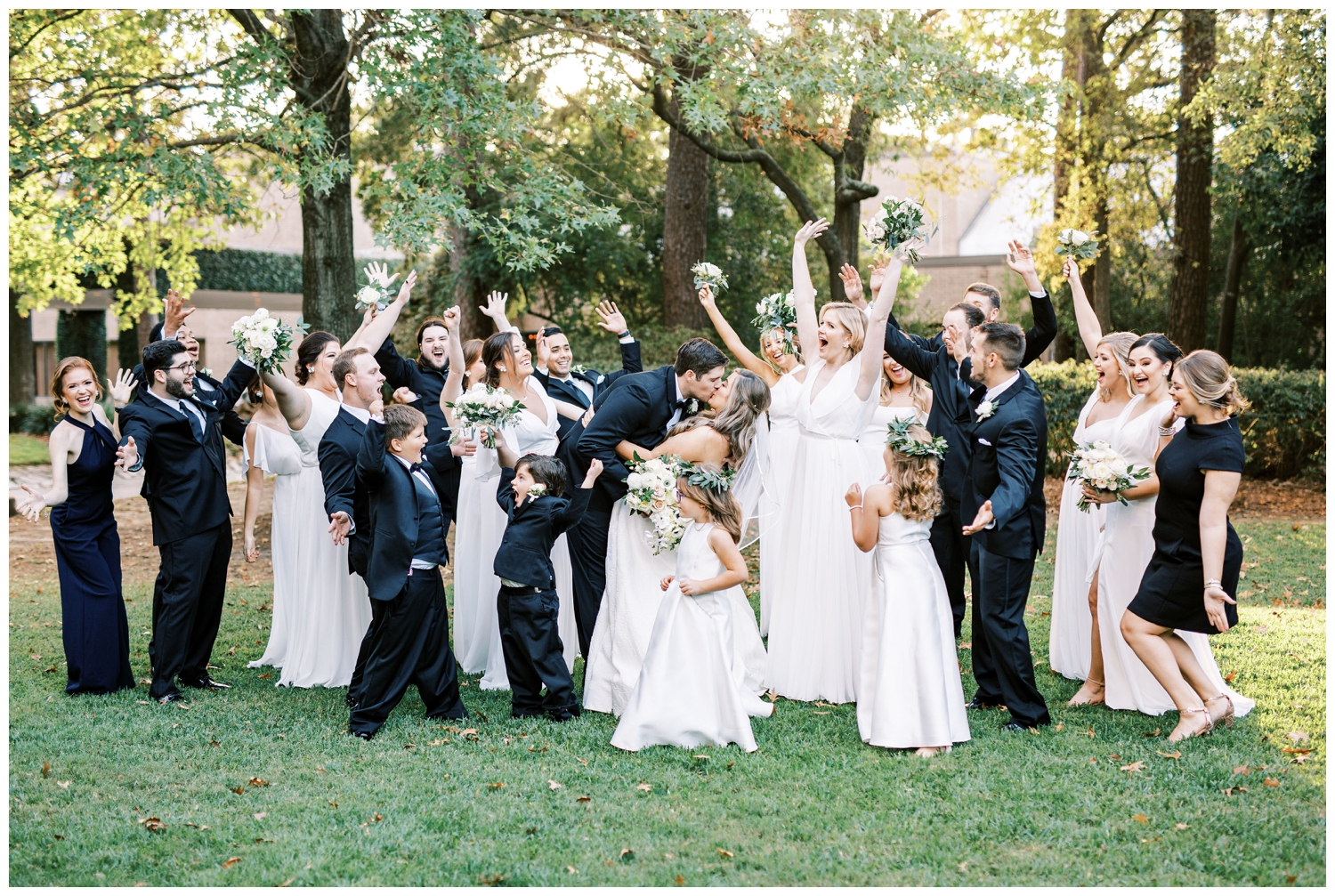 the Houstonian Hotel wedding bridal party with black tuxes and white bridesmaids dress