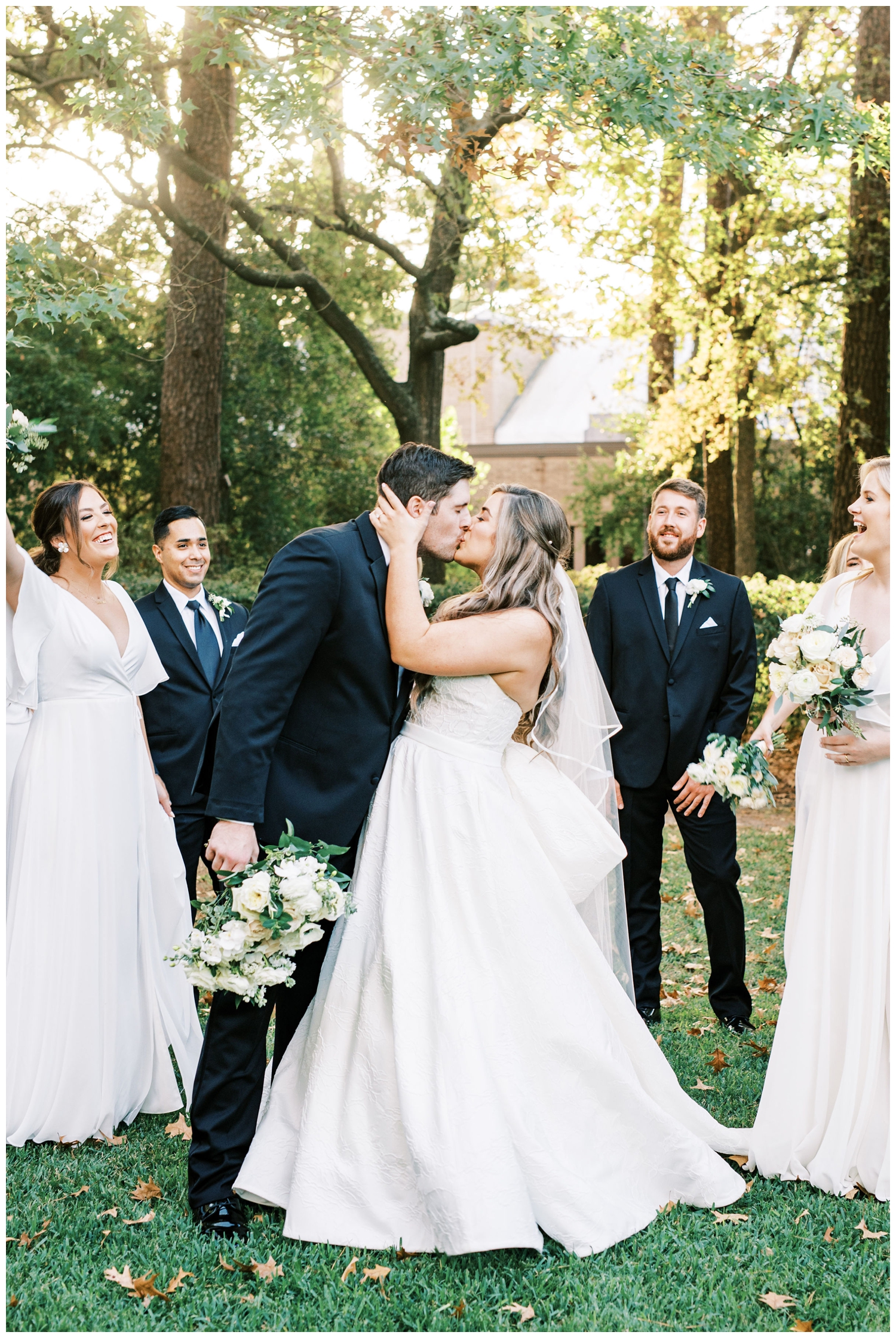 bride and groom kissing for portraits the Houstonian Hotel wedding