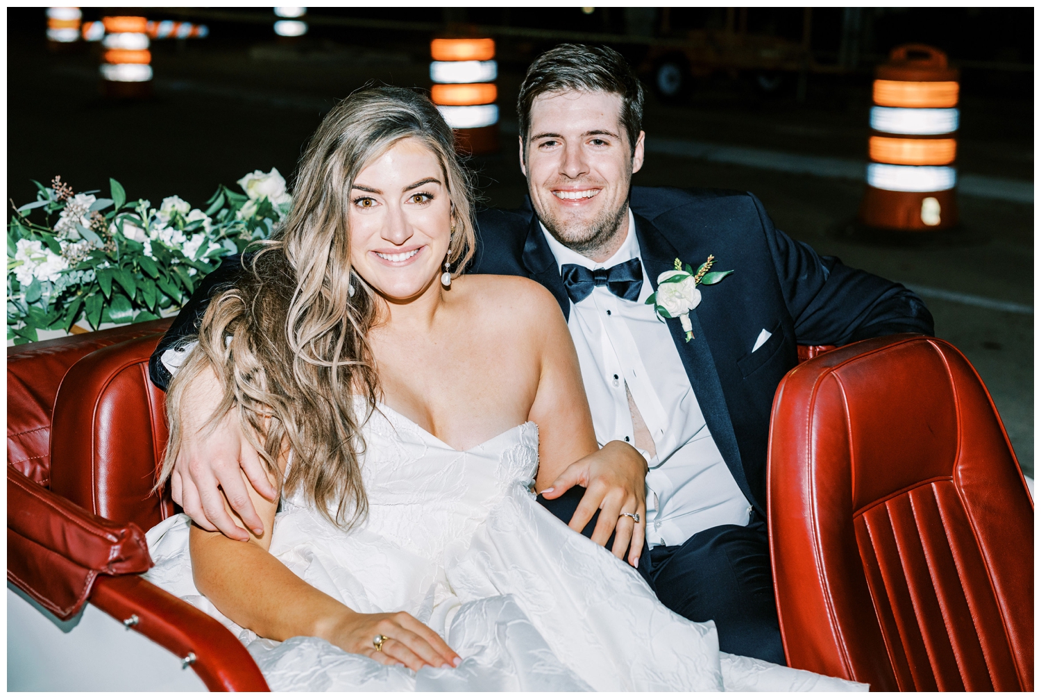 bride and groom in the get away car outside at The Houstonian Hotel wedding
