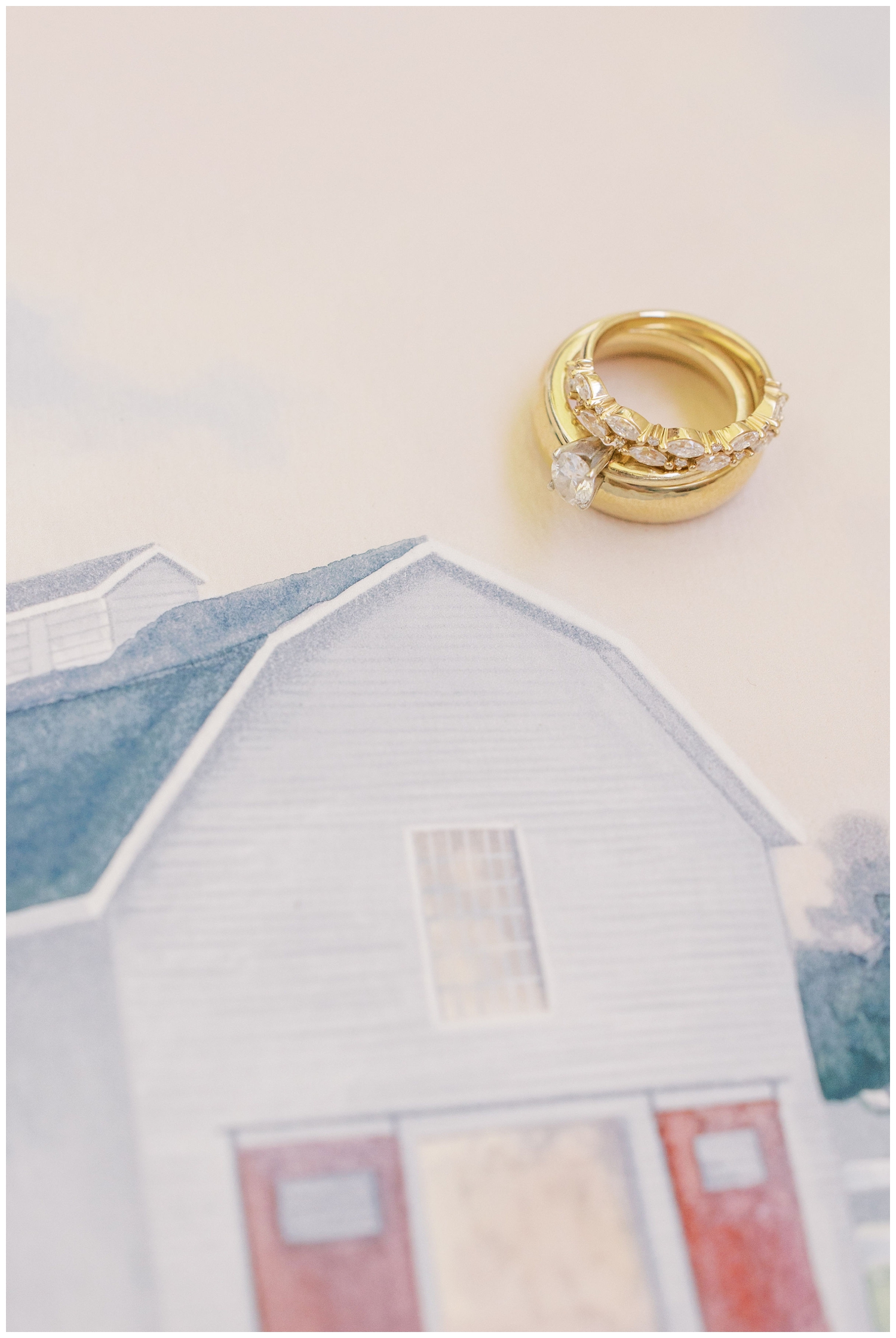 Houston white barn wedding with gold rings at The Grand Texana