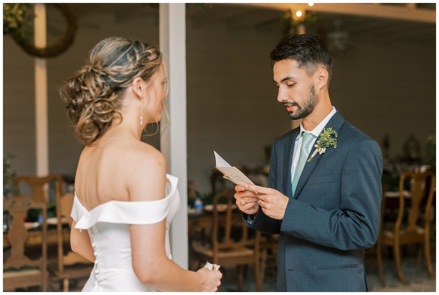 groom reading letter to his bride