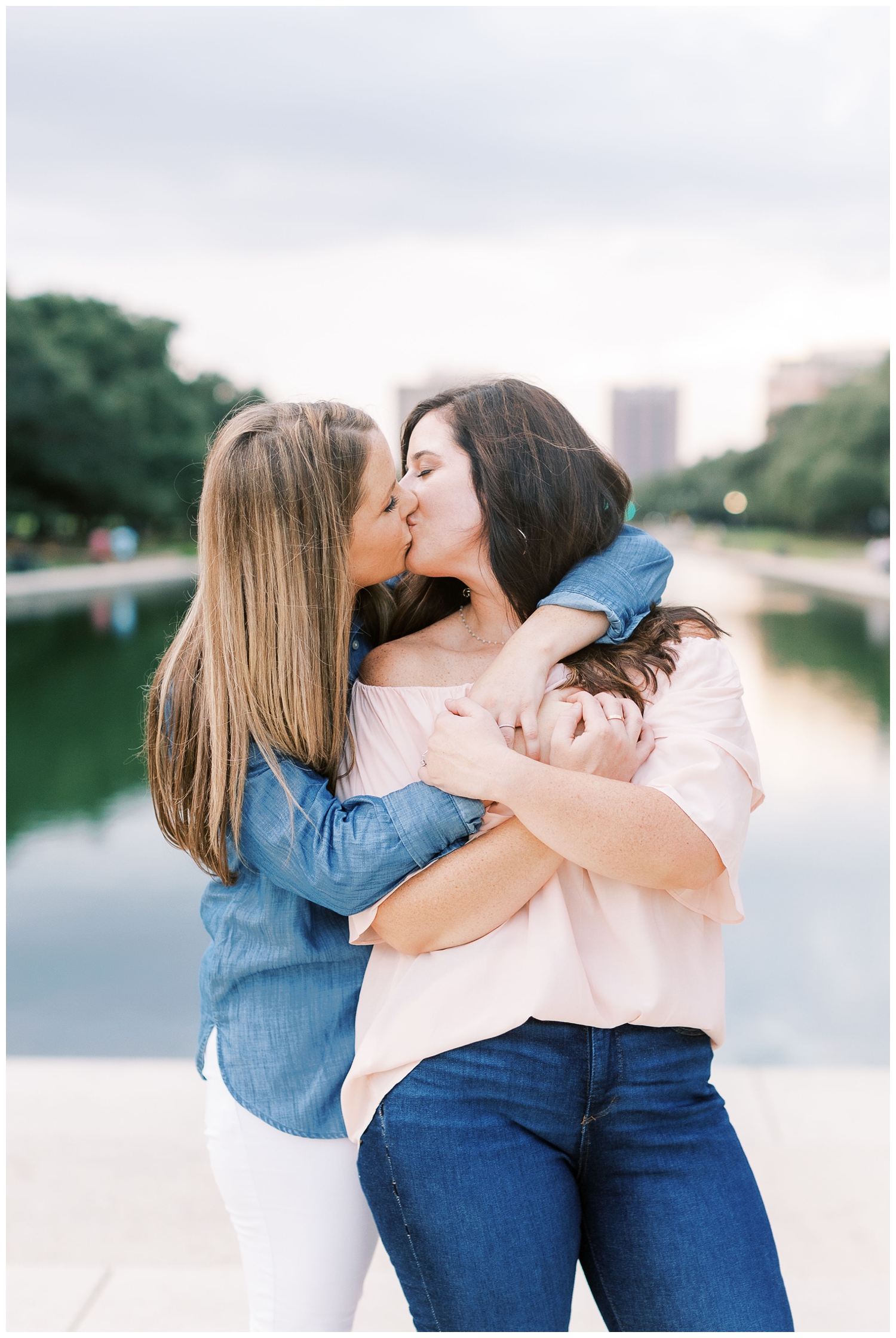 two brides kissing for Houston engagement session