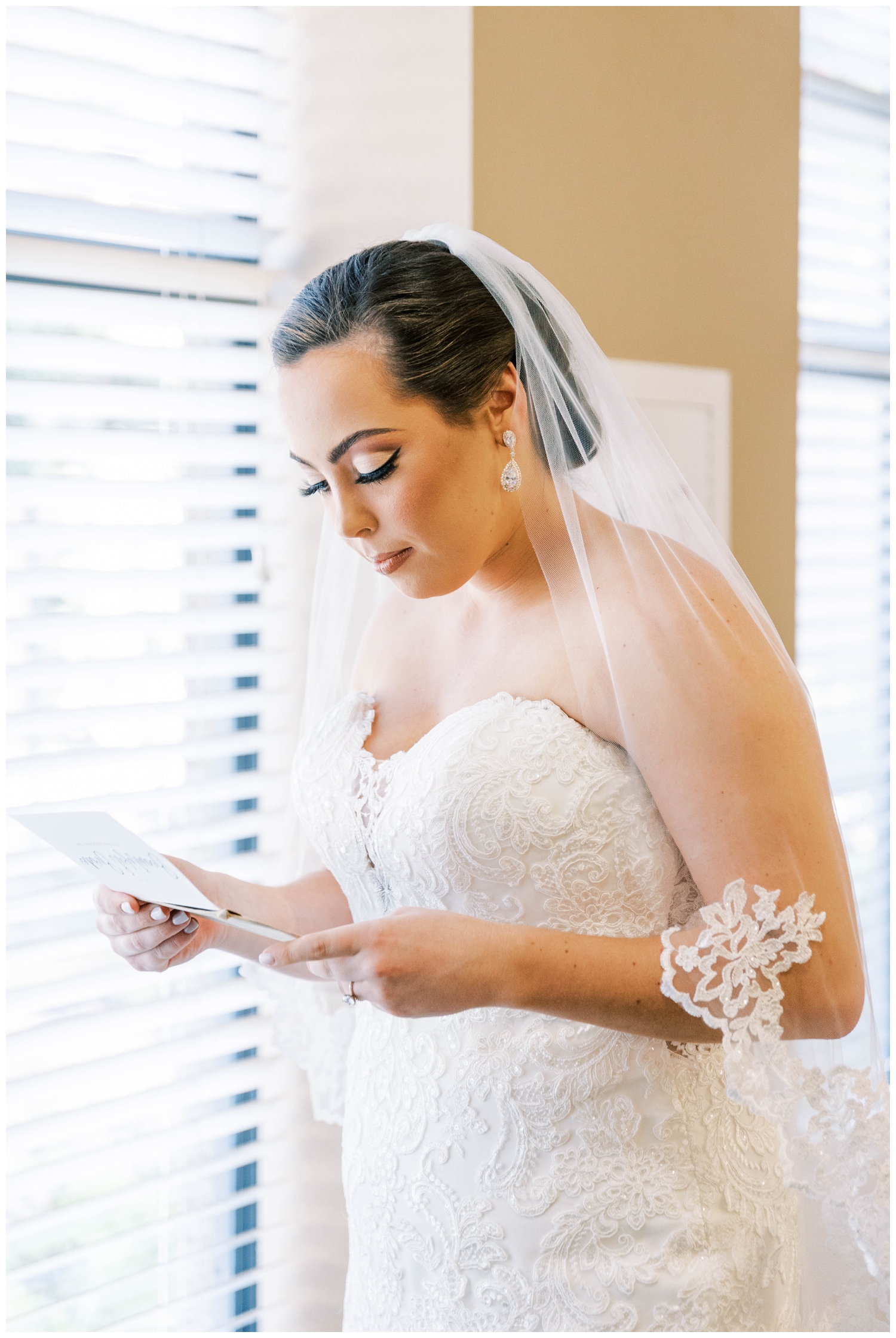 bride reading love letter from groom