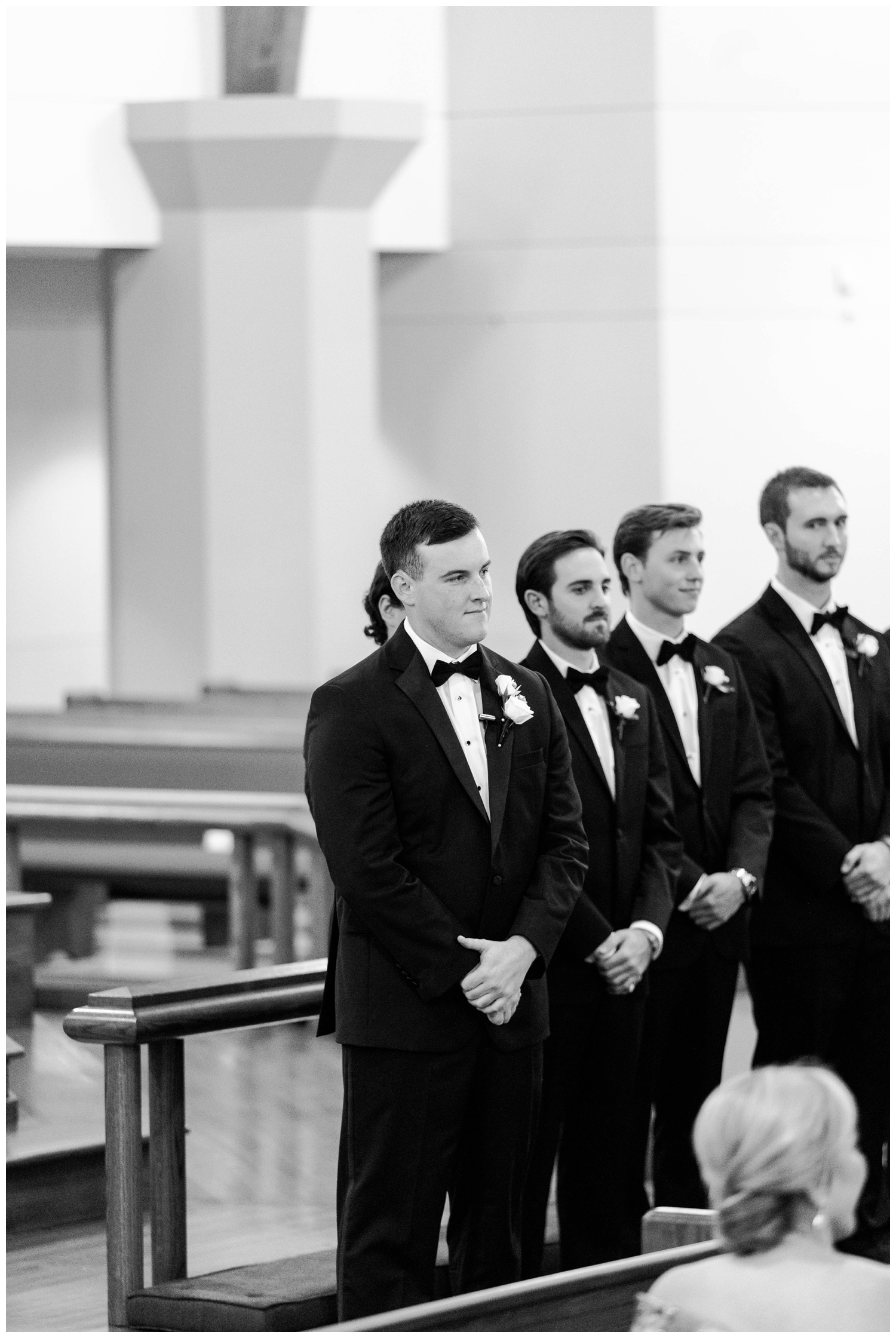 groom standing at altar waiting for bride to walk down aisle Sugarland Methodist Church