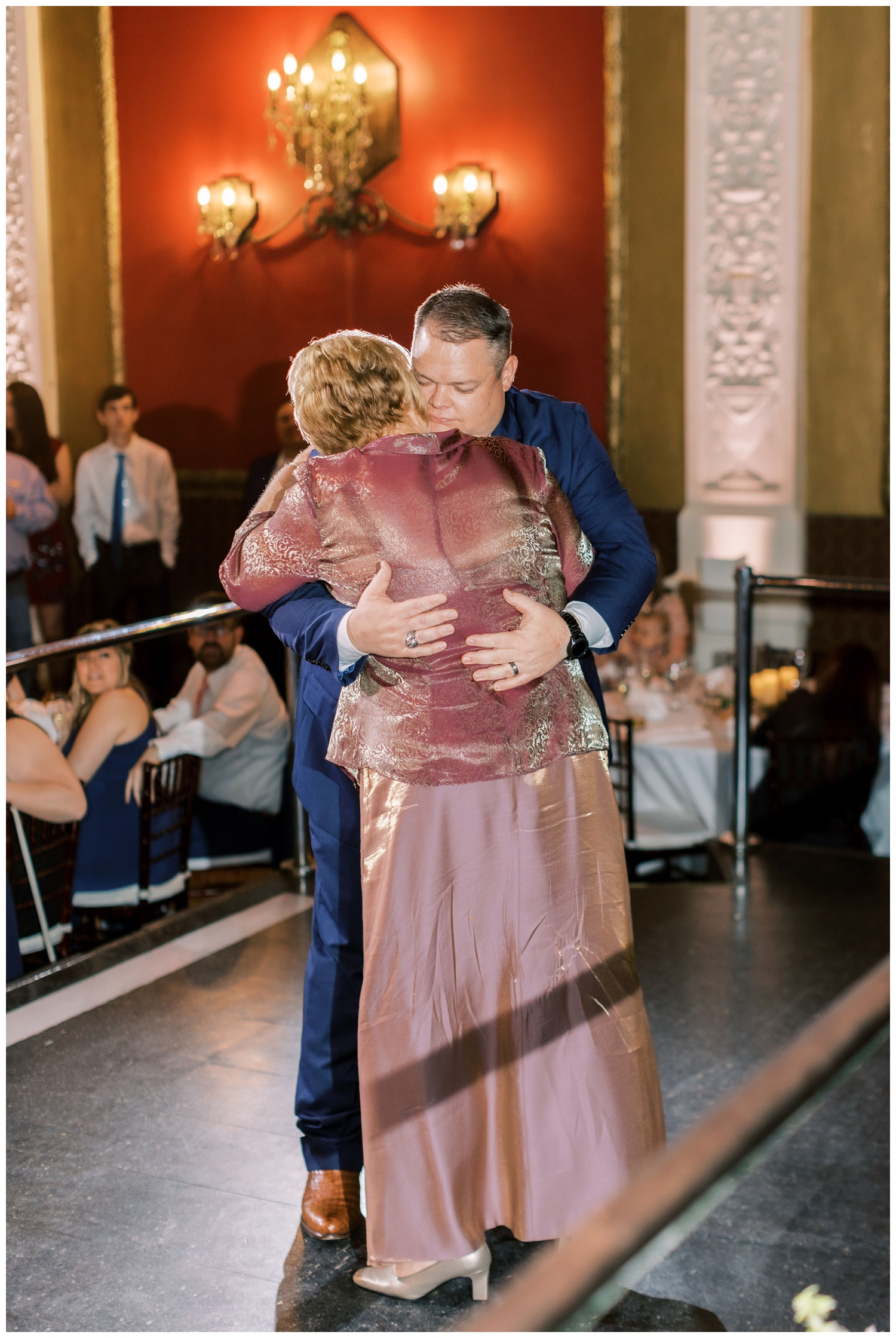 mother and groom hugging Majestic Metro Wedding reception dance