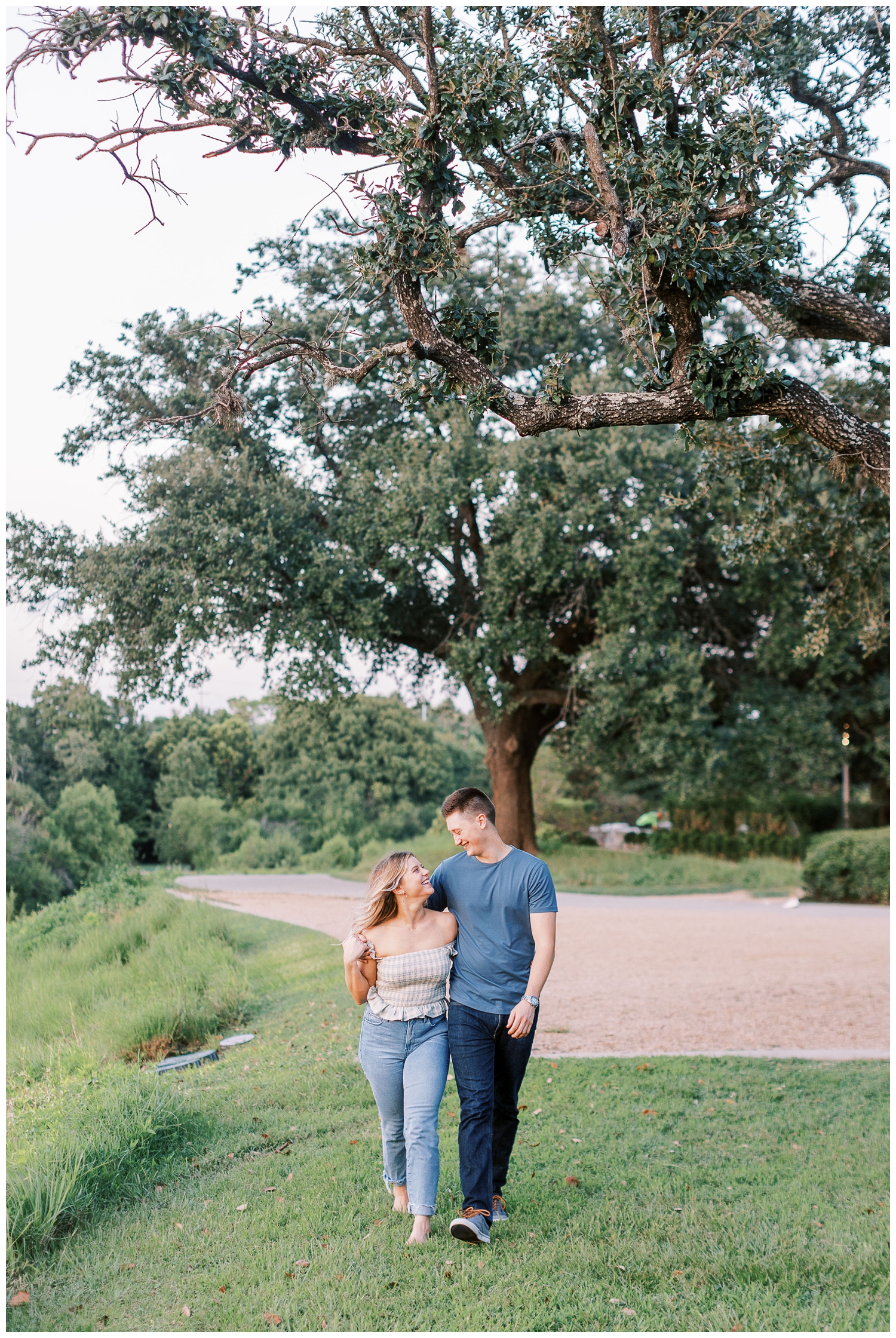 couple hugging and walking Eleanor Tinsley engagement session