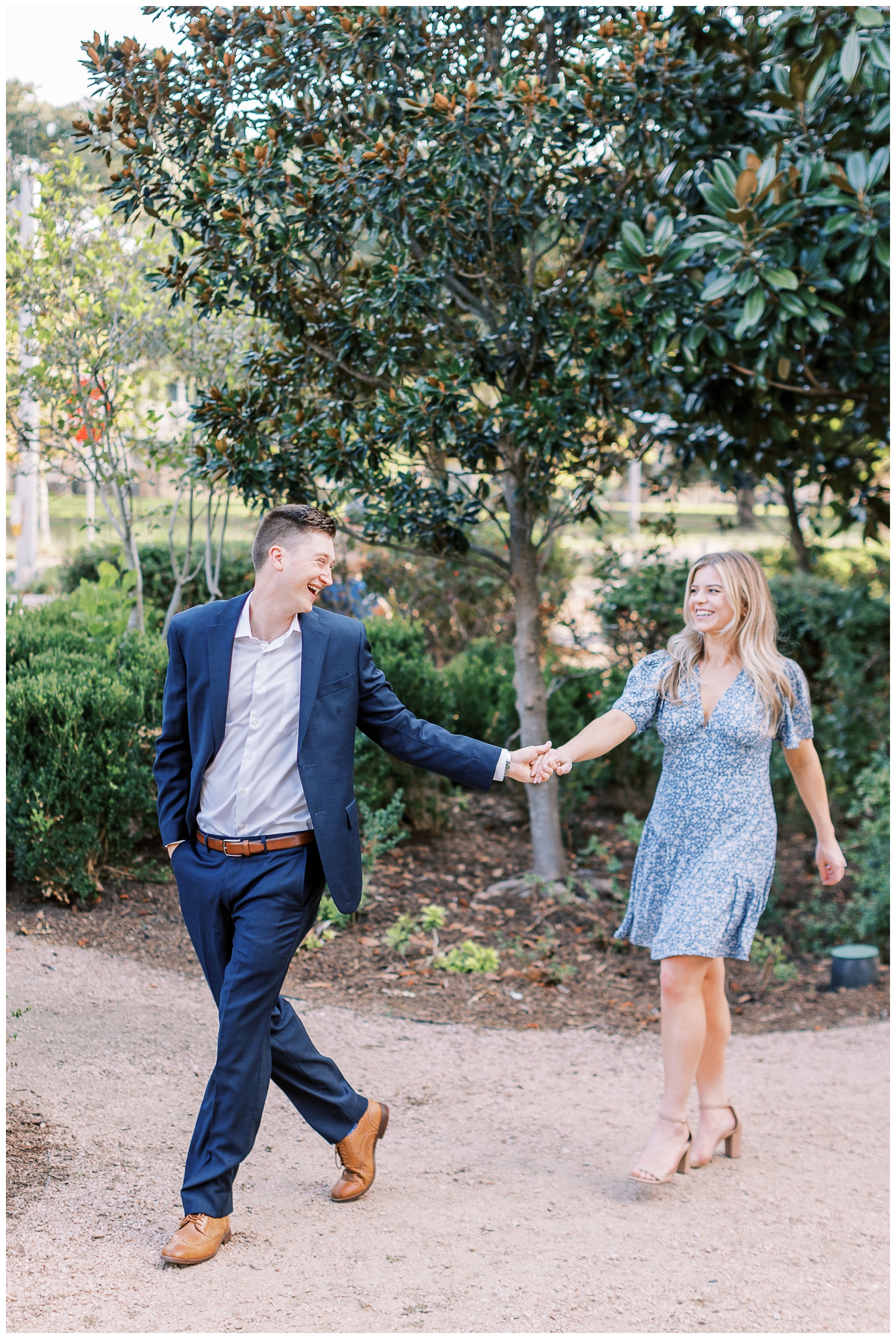 couple walking and laughing outdoors