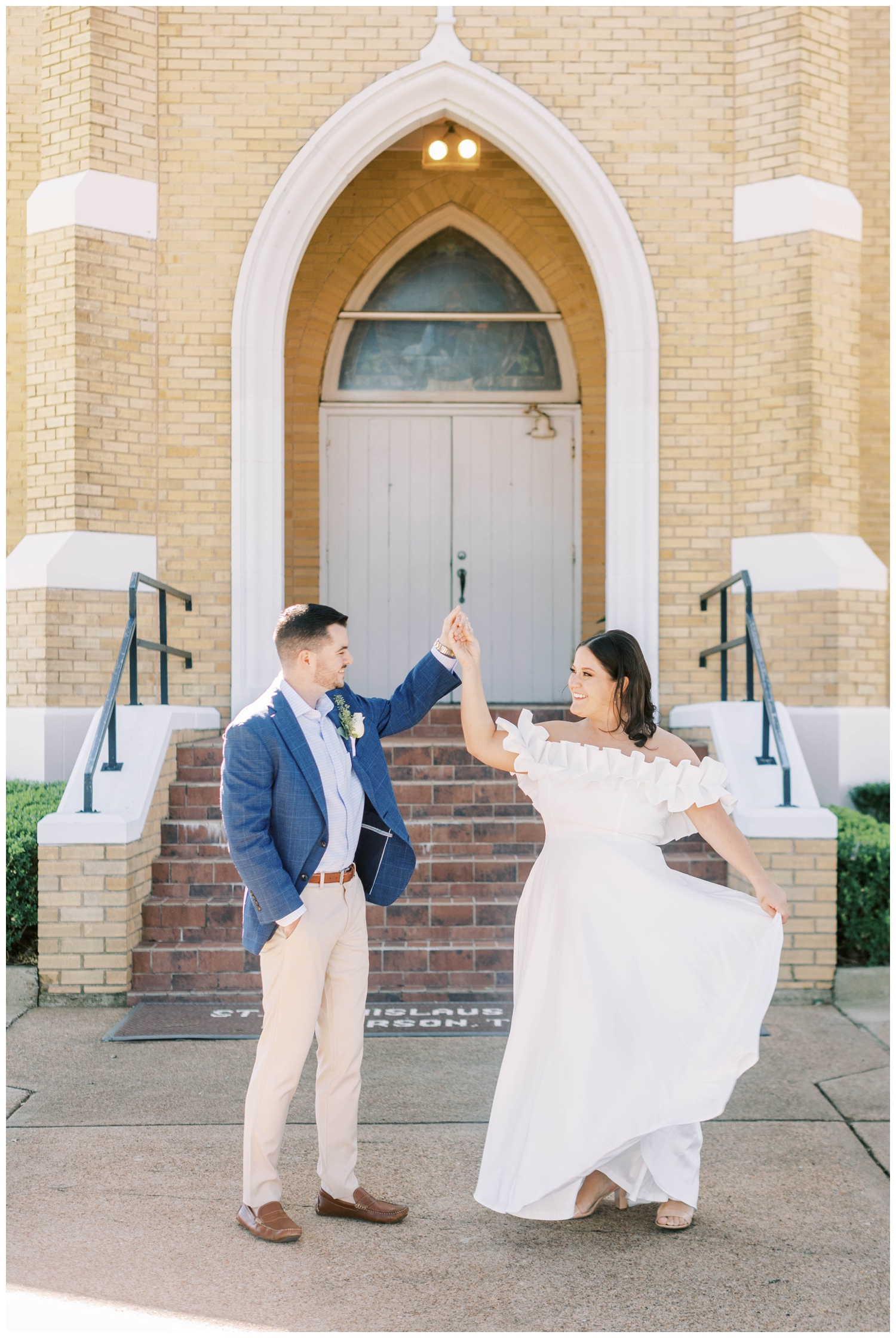 groom twirling bride outside Catholic Church in Georgetown Texas