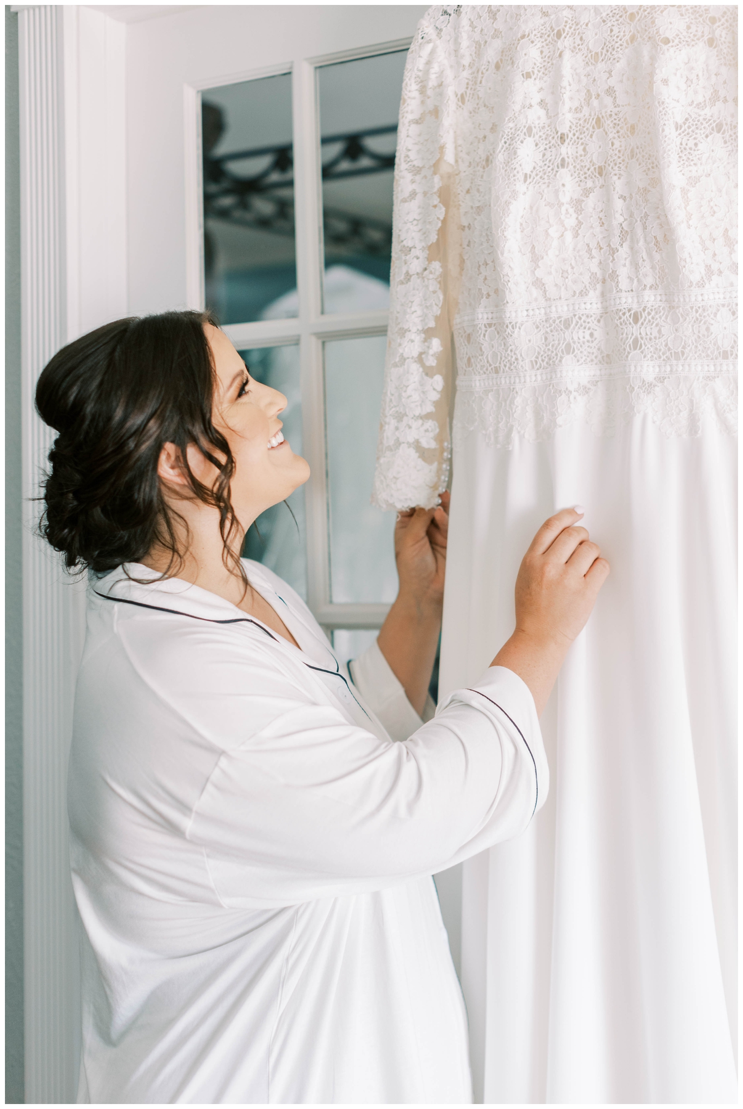 bride touching white lace wedding gown Austin outdoor wedding