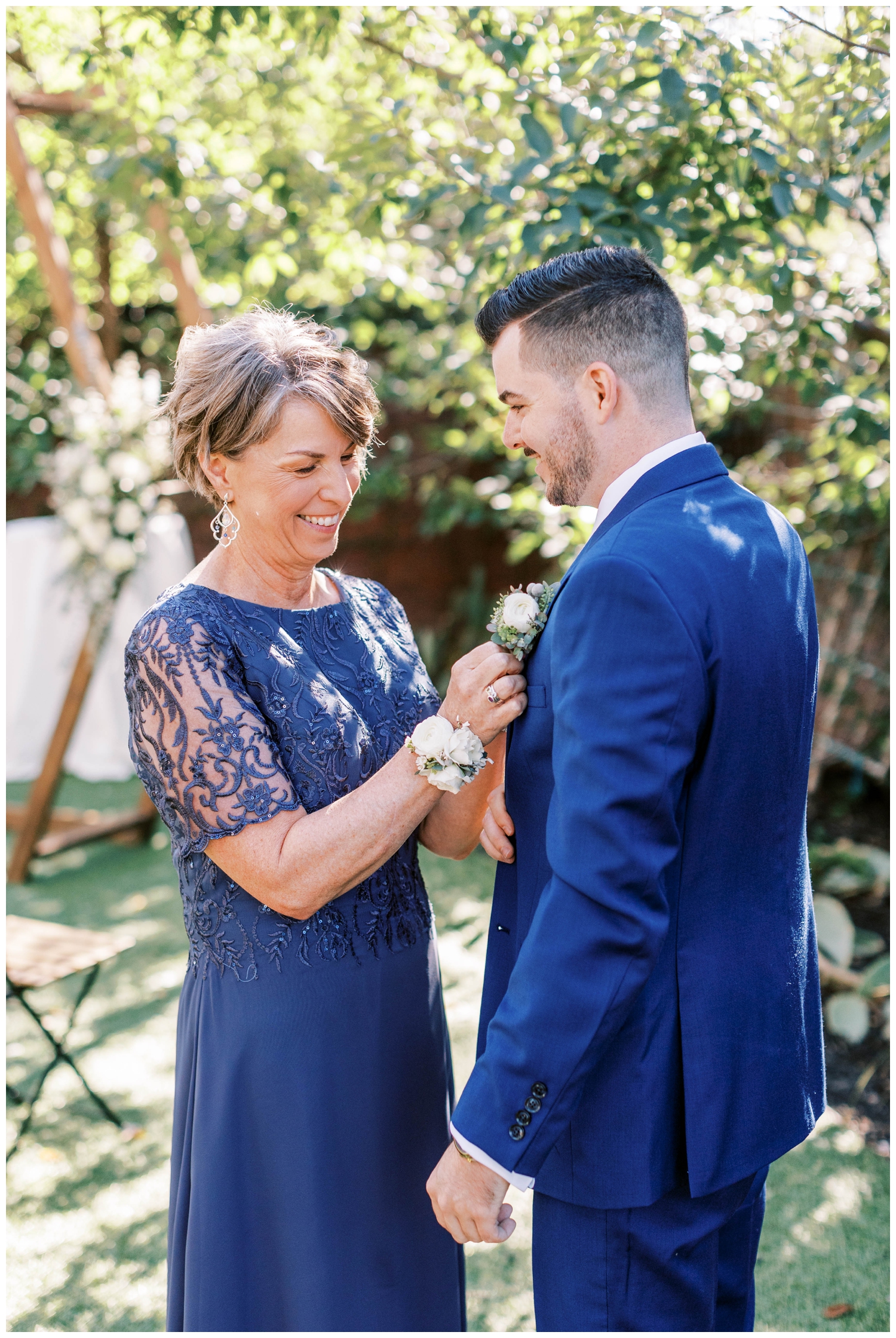 mother of groom pinning on bout
