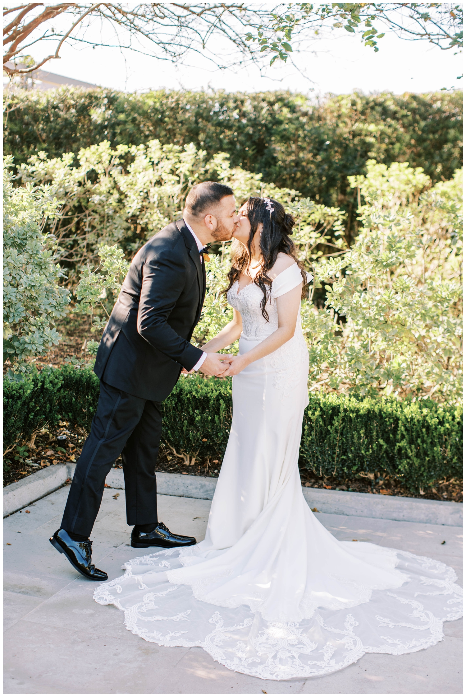 McGovern Centennial Gardens Wedding bride groom kissing after first look