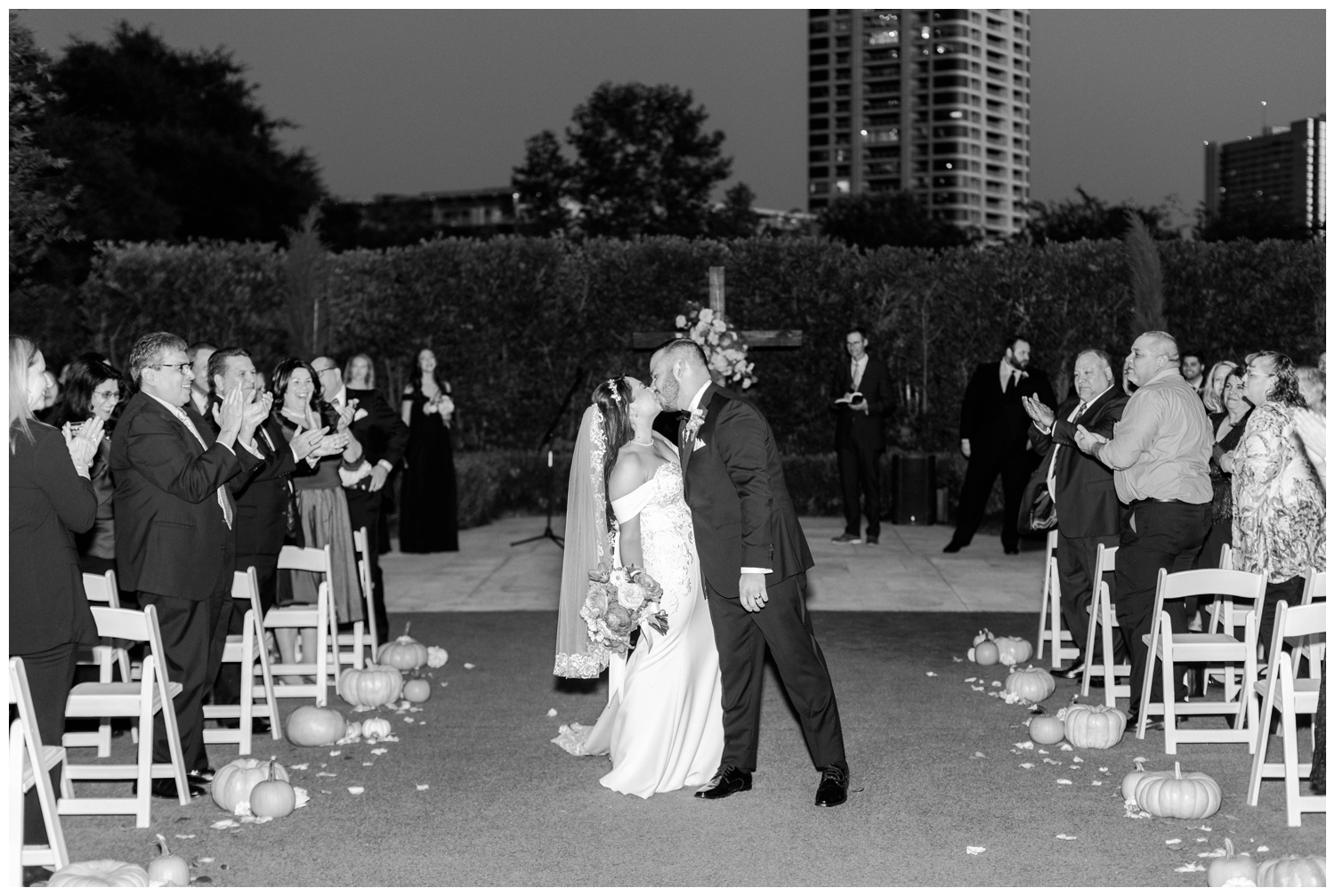 bride and groom kissing portrait black and white after McGovern Centennial Gardens ceremony