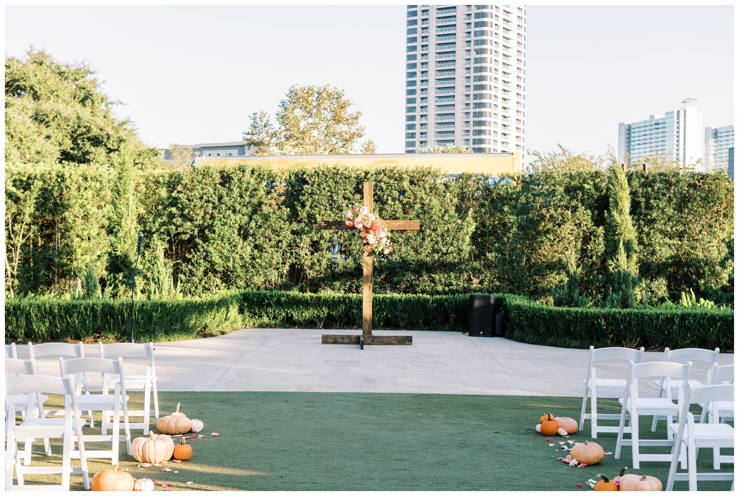 cross with florals for McGovern Centennial Gardens wedding ceremony