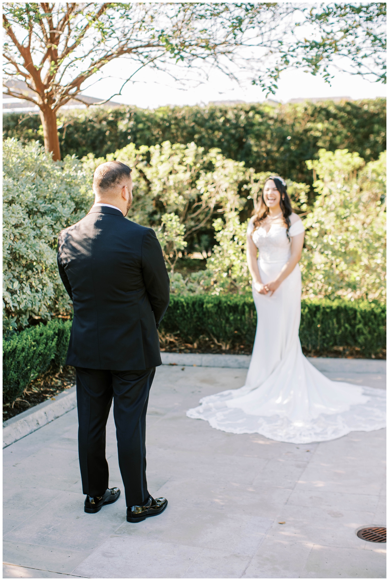 groom seeing bride during first look McGovern Centennial Gardens Wedding Houston Texas