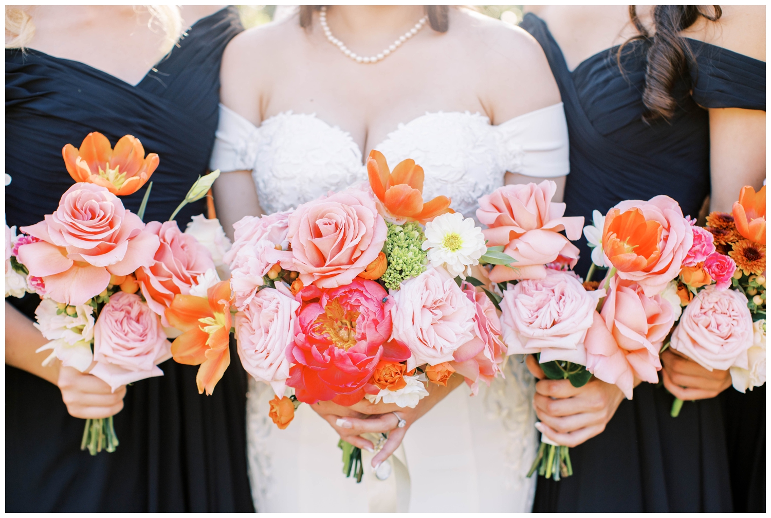 bride and orange pink bouquet close up