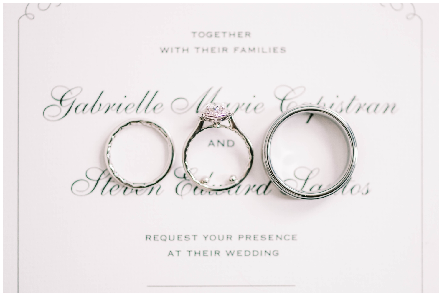 platinum wedding rings on white invitation suite McGovern Centennial Gardens Wedding