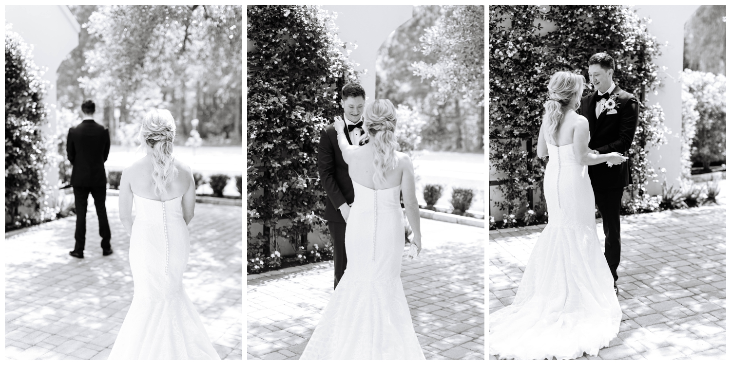 black and white portrait of bride and groom first look outside The Peach Orchard Wedding Venue