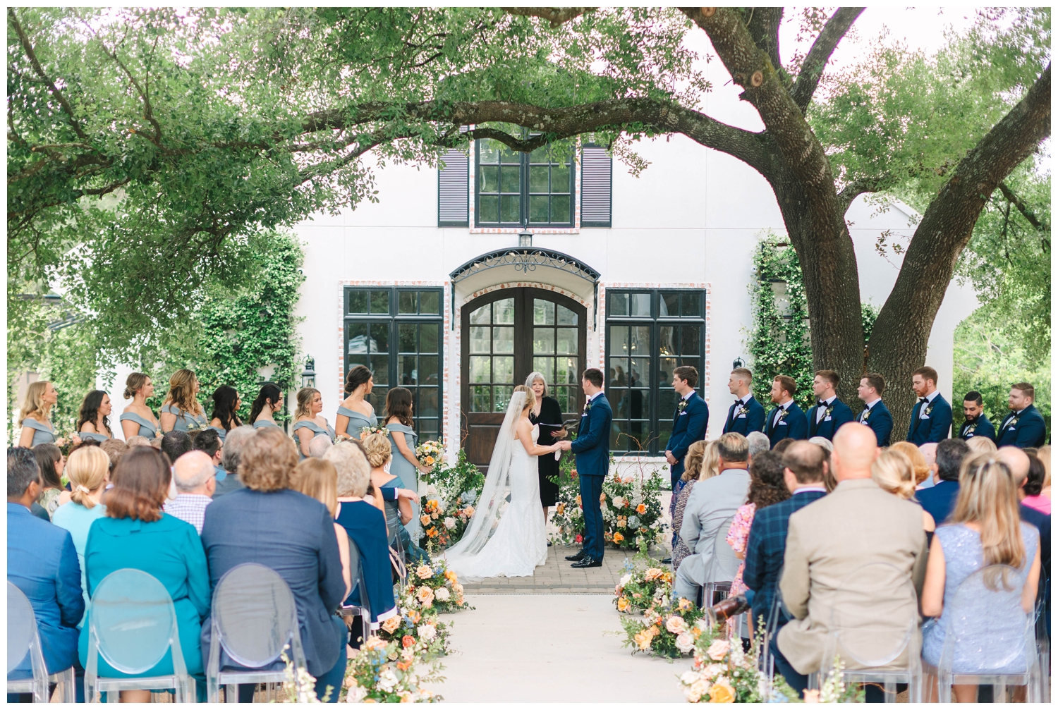 The Peach Orchard Wedding Venue outdoor ceremony bride and groom holding hands