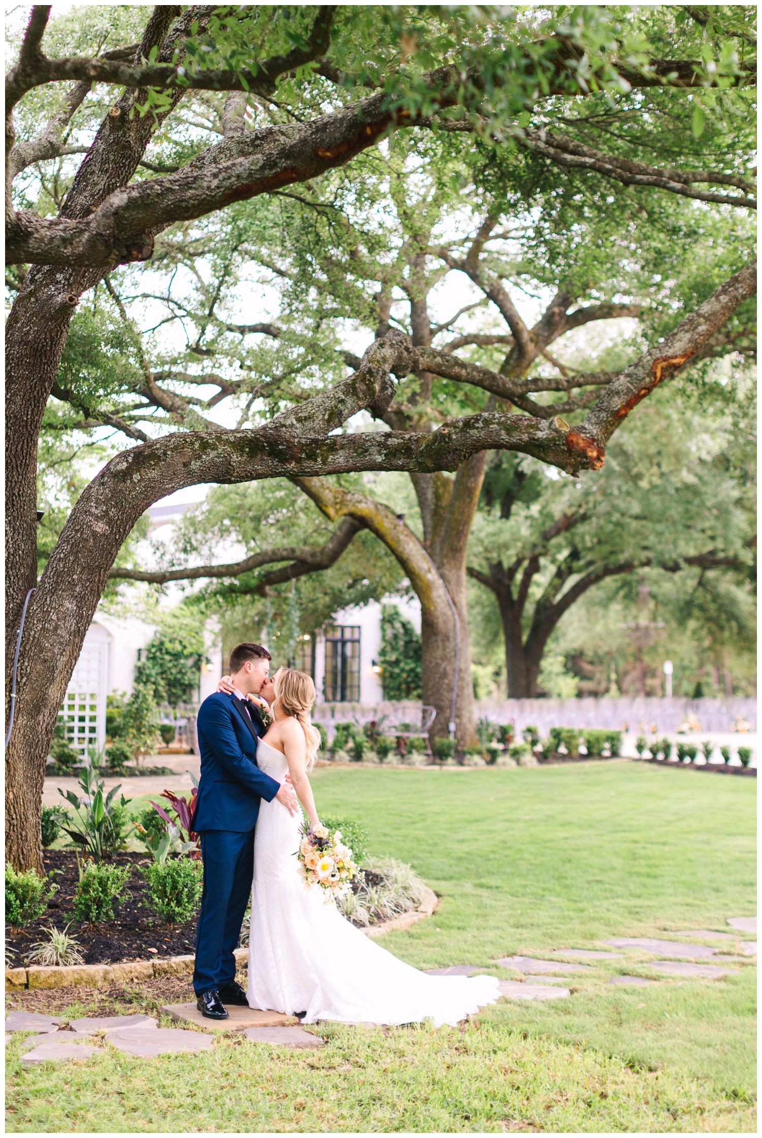 bride and groom portrait under live oak tree at The Peach Orchard Wedding Venue