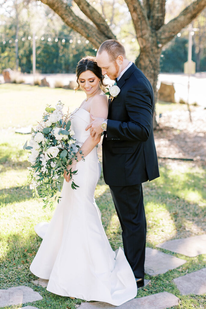 Bride and groom portraits at Lindsay Lakes of Cypress in Texas