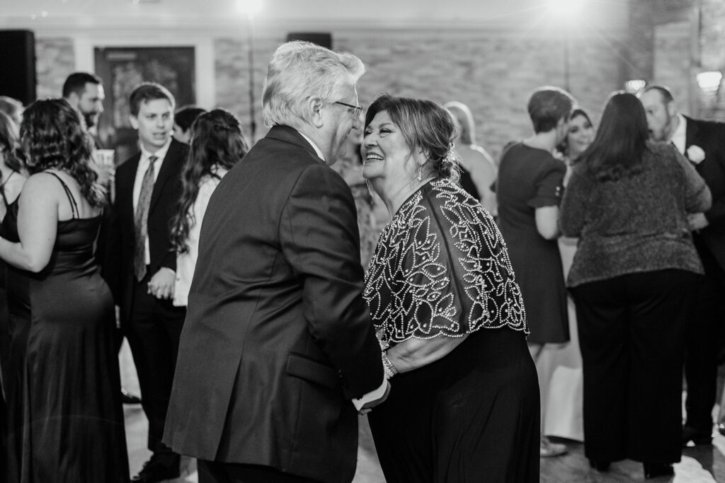 brides parents dancing during reception