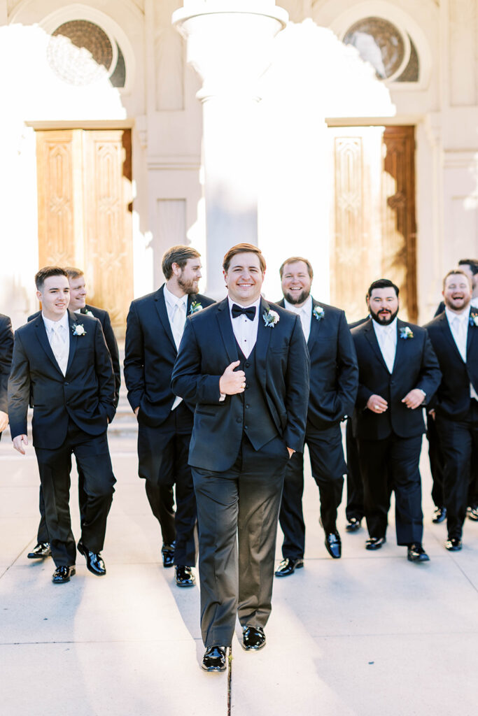 Groom and groomsman photos at The Sacred House Church in Galveston