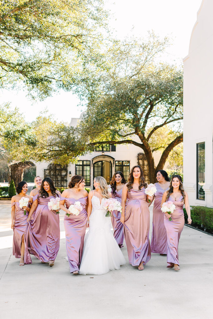 Bride and bridesmaids photos outside of The Peach Orchard wedding venue
