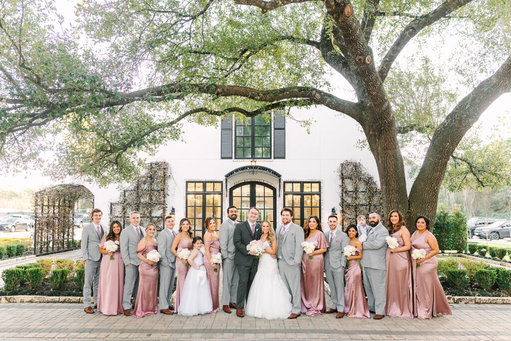 Wedding Party Photos Outside of The Peach Orchard - The Woodlands Wedding Venue