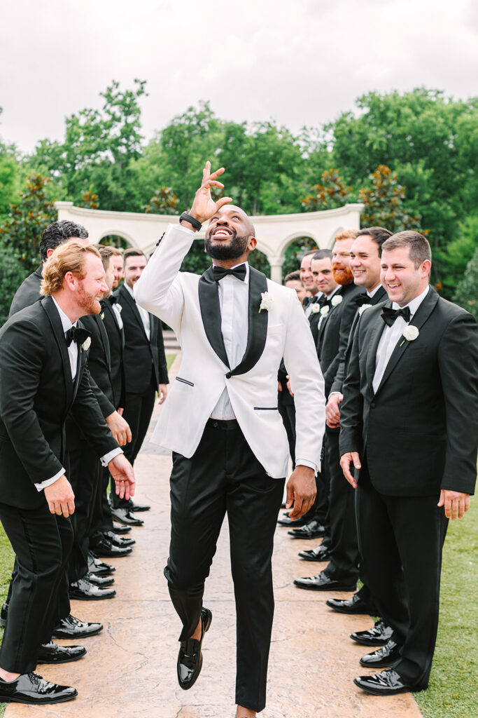 Groom and groomsmen photos from a classic black tie wedding in Texas