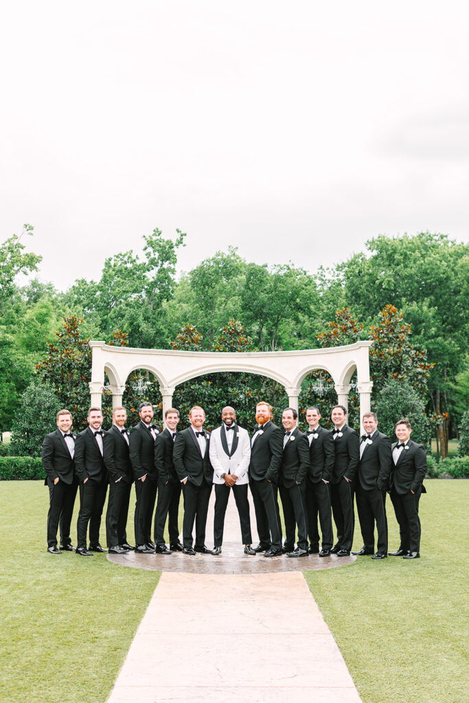 Groom and groomsmen photos from a classic black tie wedding in Texas