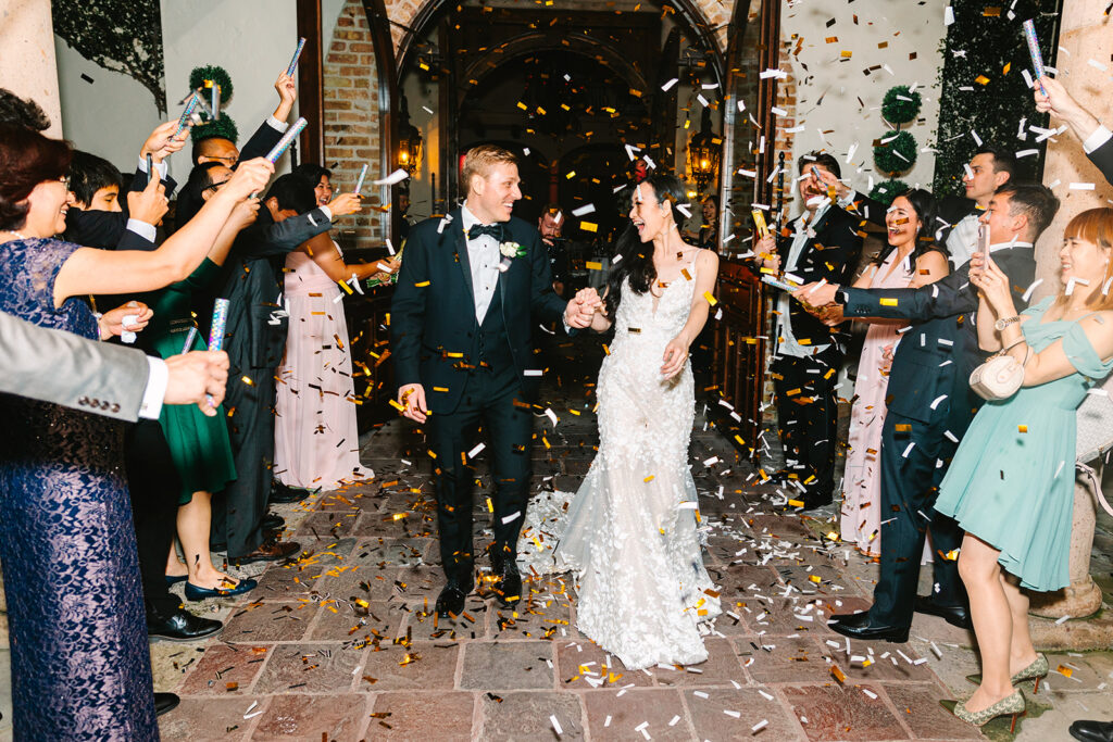 Bride and grooms confetti wedding exit