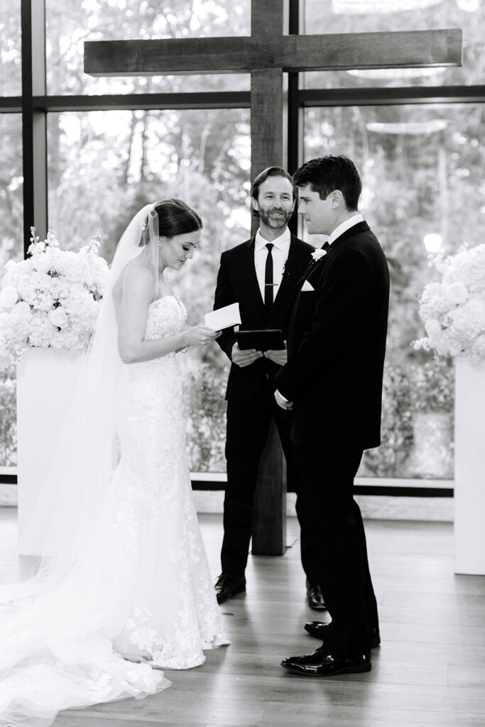 An indoor wedding ceremony at The Luminaire venue in Montgomery Texas 