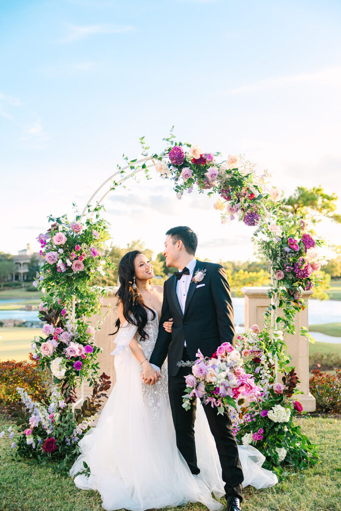 Outdoor bride and groom portraits at The Royal Oaks Country Club in Houston