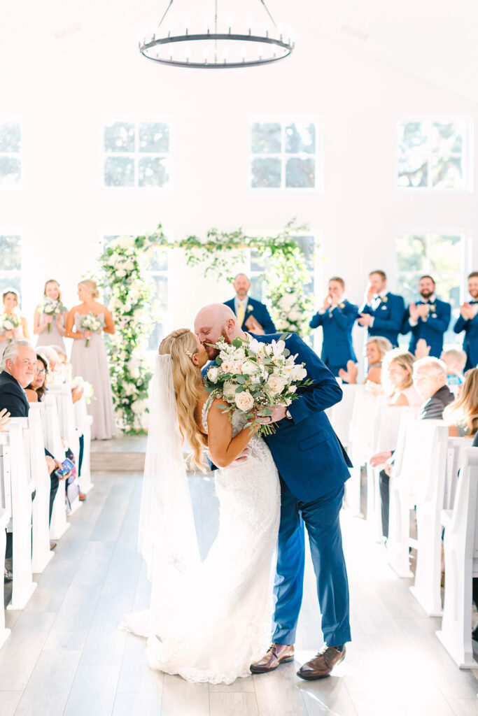 An indoor wedding ceremony at Laura May Chapel