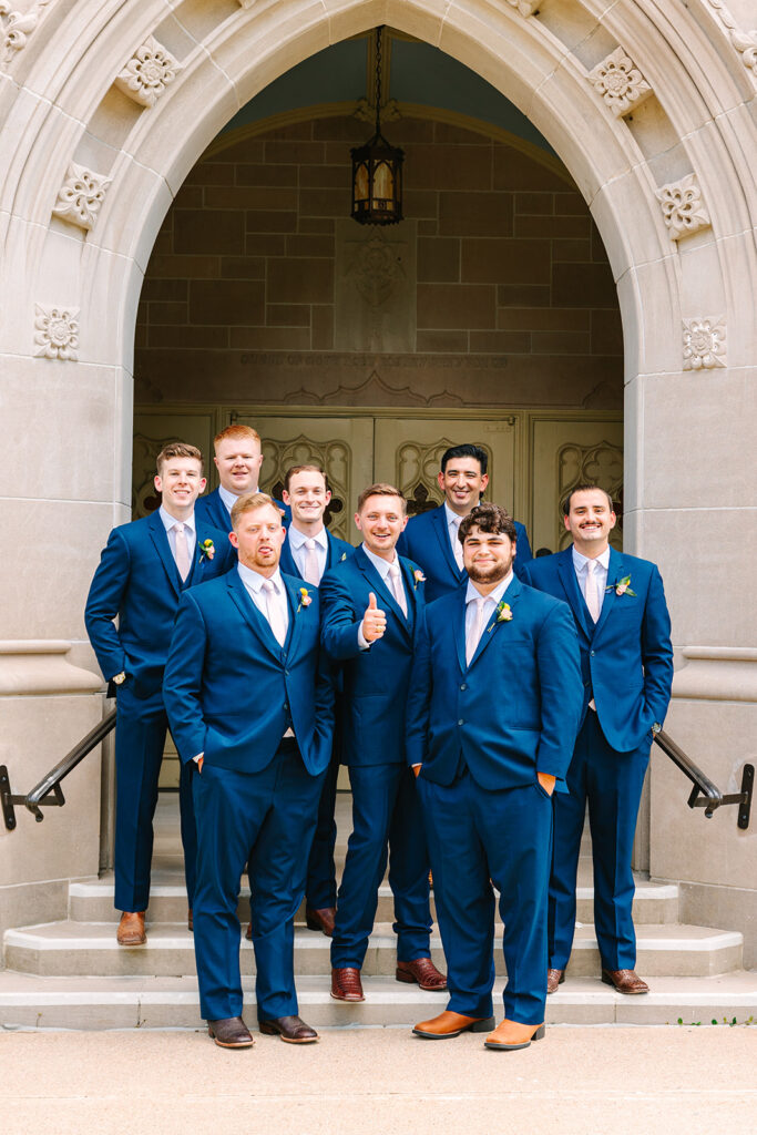 Groom and groomsmen portraits from a colorful summer wedding in Texas