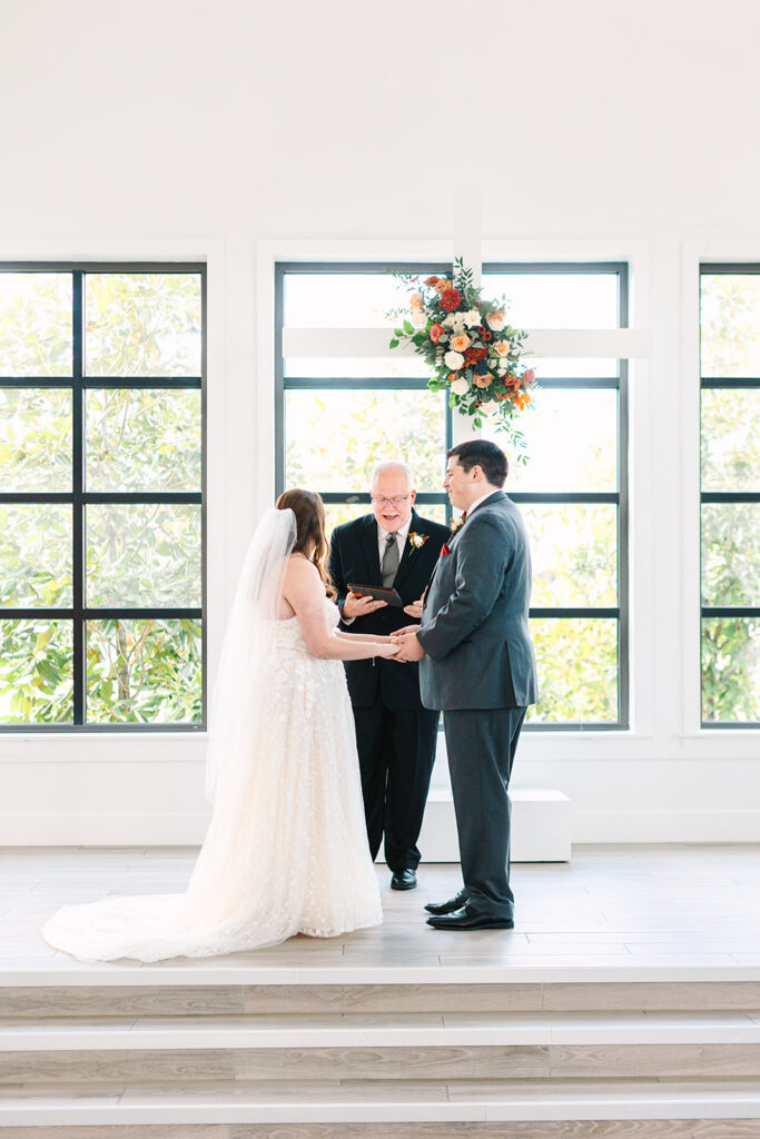 An indoor wedding ceremony in The Chapel at Boxwood Manor - North Houston TX Wedding Venue