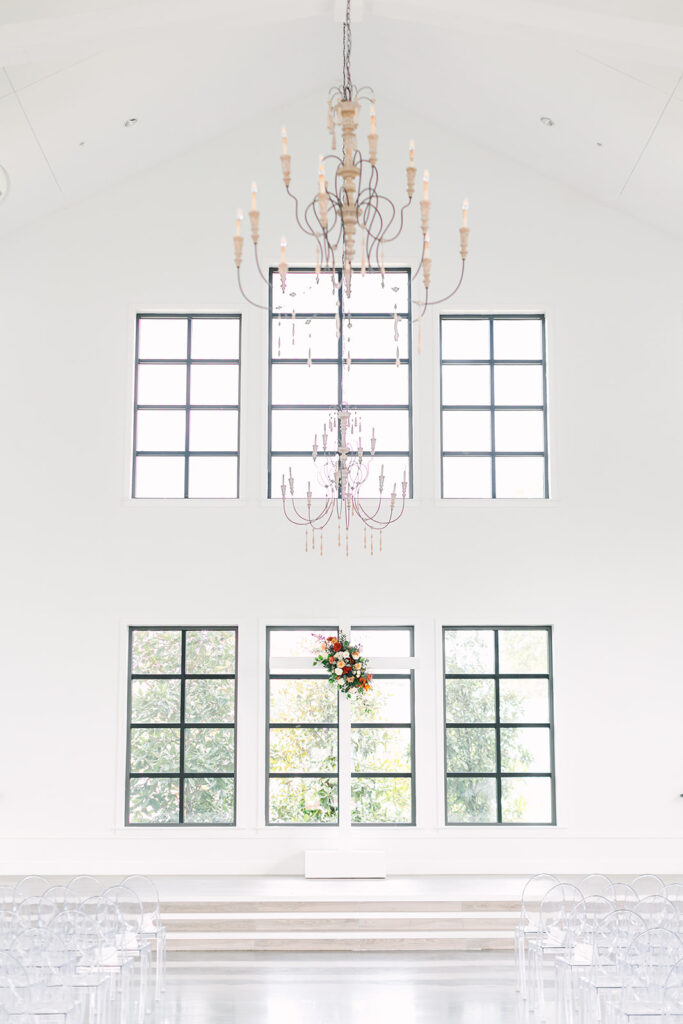 An indoor wedding ceremony in The Chapel at Boxwood Manor - North Houston TX Wedding Venue