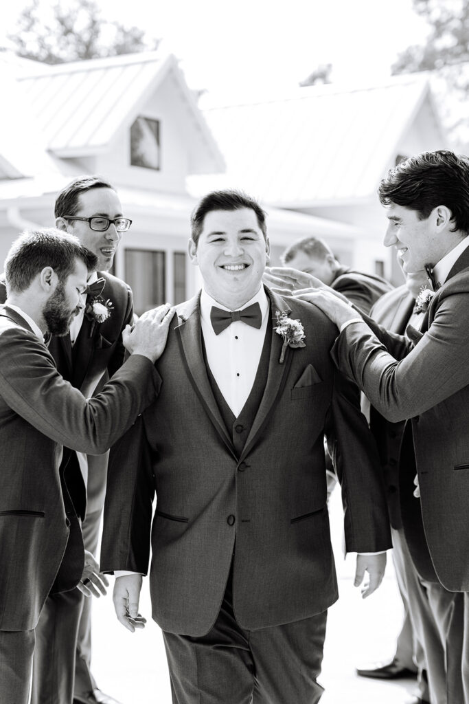 Groom and groomsman photos from a North Houston TX Wedding at Boxwood Manor