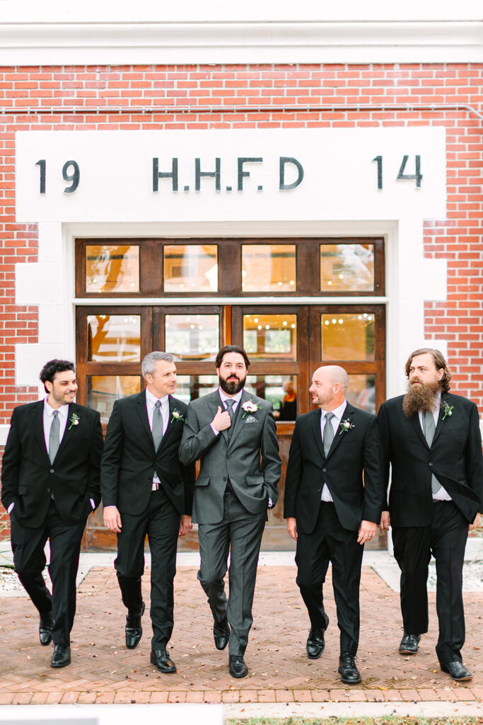 Groom and groomsmen photos from a vintage inspired Heights Fire Station Houston wedding 