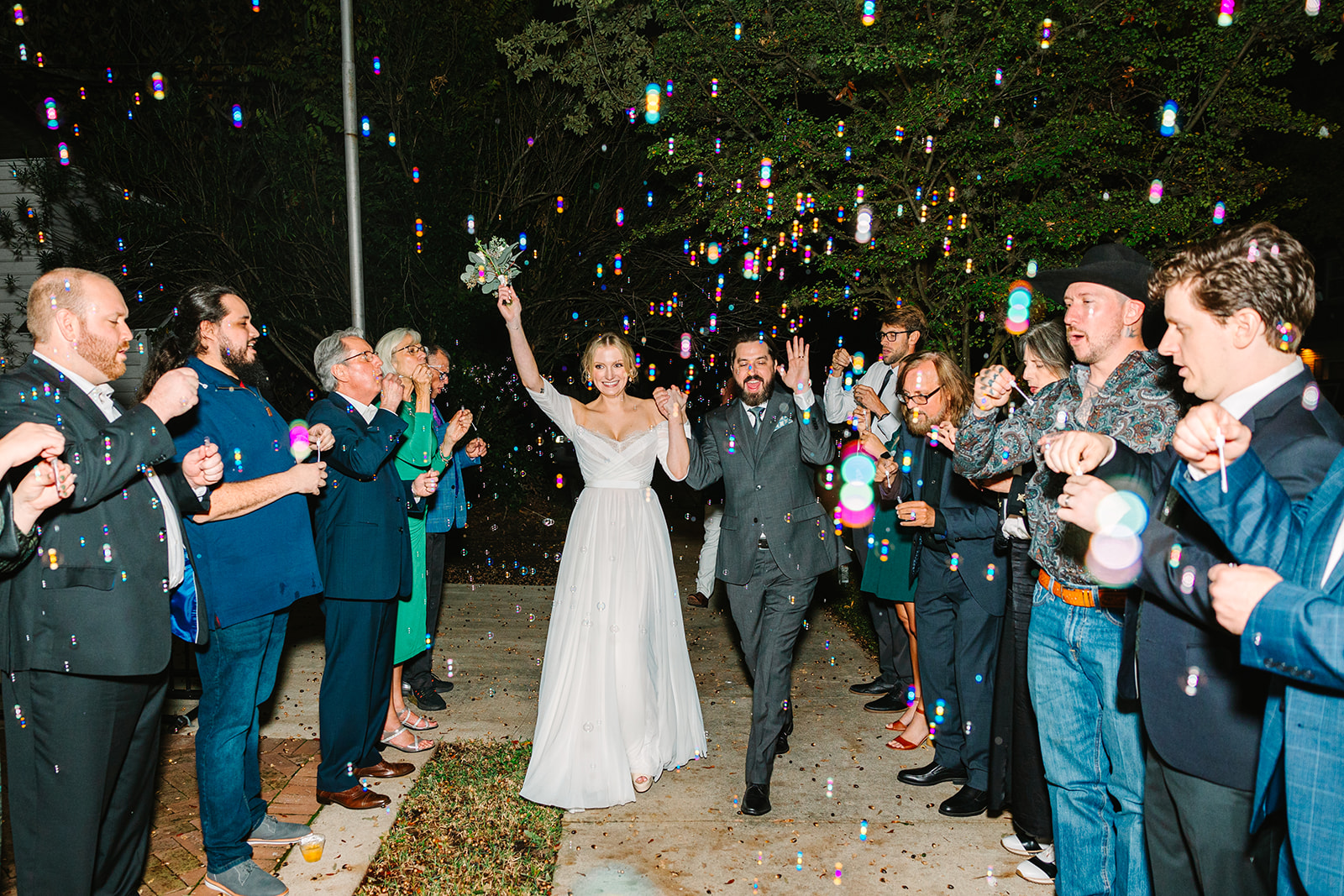 Bride and grooms bubble wedding exit